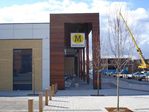 dark wood cladding Morrisons 