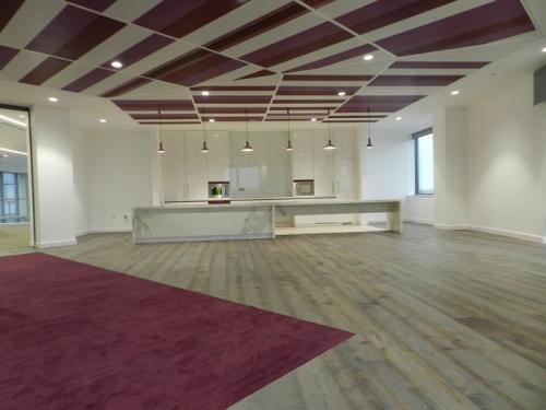 purple ceiling cladding over white marble kitchen area