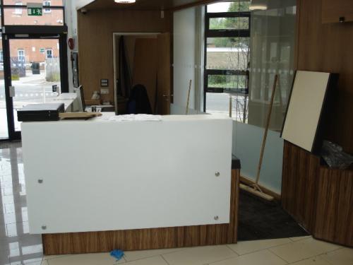 white modern reception desk