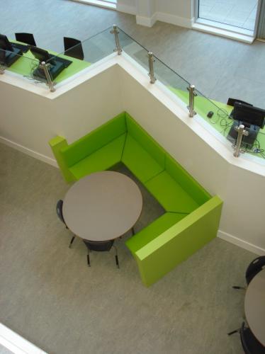 green seating area with round table