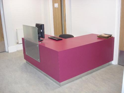 pink reception desk