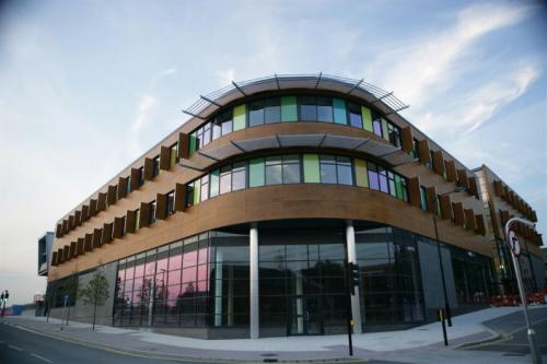 wooden cladding on curved building