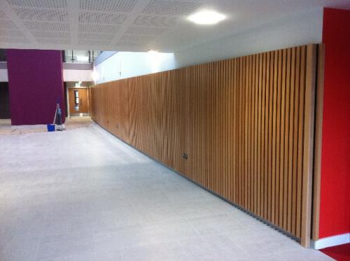 wooden cladding in corridor