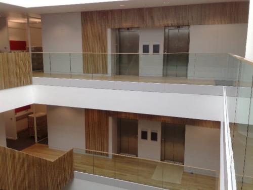 wooden cladding surrounding lifts